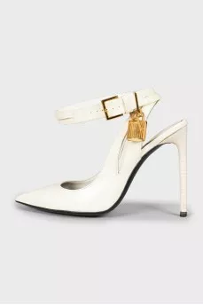 Patent leather shoes with a golden lock