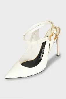 Patent leather shoes with a golden lock