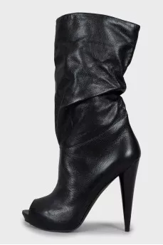 Wedge heel boots with tag