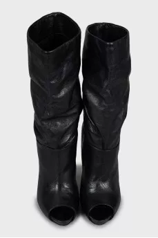 Wedge heel boots with tag