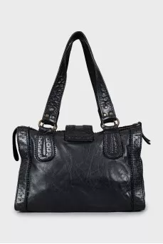Black bag with perforated leather