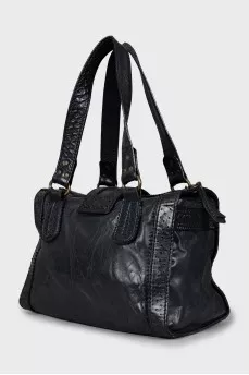 Black bag with perforated leather