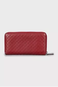 Wallet with branded embossed leather