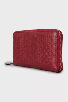 Wallet with branded embossed leather