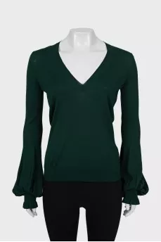 Knitted pullover with ruffles on the sleeves