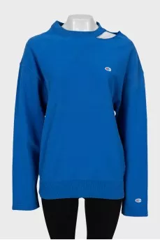 Blue sweatshirt with a torn effect