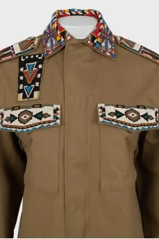 Khaki jacket decorated with beads