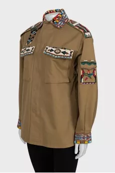 Khaki jacket decorated with beads