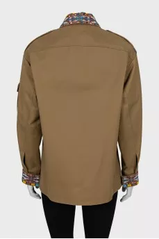 Khaki jacket decorated with beads