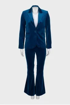 Velour suit with flared trousers and tag