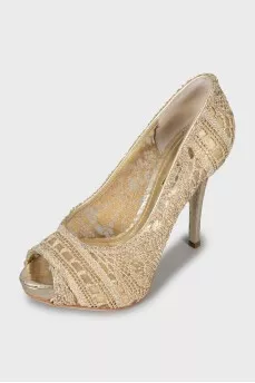 Golden patterned shoes