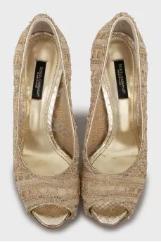 Golden patterned shoes