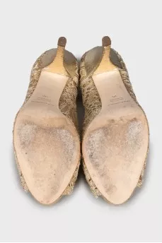 Golden patterned shoes