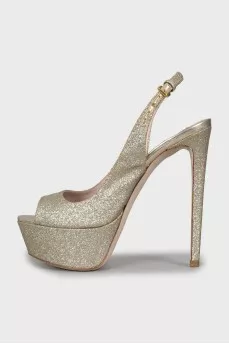 Golden high heels