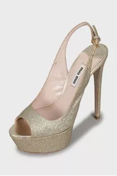 Golden high heels