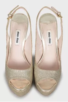 Golden high heels
