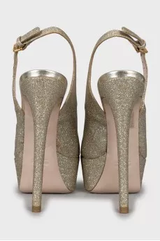 Golden high heels