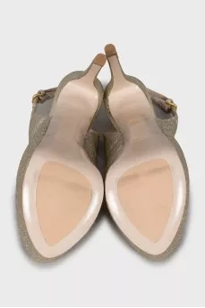 Golden high heels