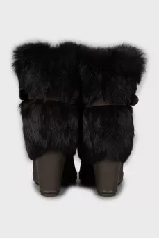 Insulated boots with high wedge heels