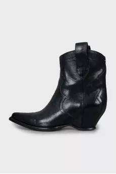 Leather ankle boots with a figured wedge heel