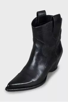 Leather ankle boots with a figured wedge heel