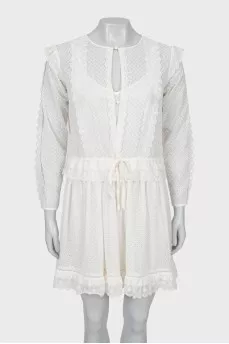 Fitted dress with ruffles and perforation
