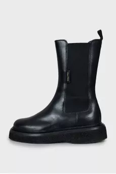Black boots with textile inserts