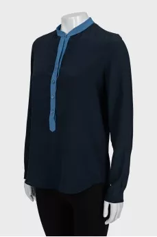 Blue silk blouse with a loose fit