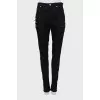 Skinny jeans decorated with zippers