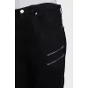 Skinny jeans decorated with zippers