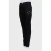 Skinny jeans decorated with zippers