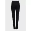 Skinny jeans decorated with zippers