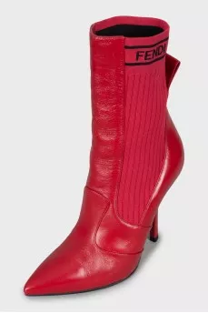 Red ankle boots made of leather and fabric