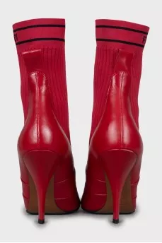 Red ankle boots made of leather and fabric