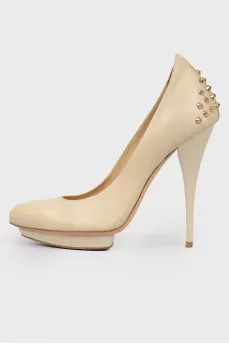 Beige studded pumps