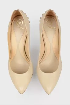 Beige studded pumps