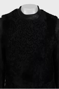 Fur coat with leather sleeves