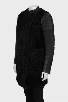 Fur coat with leather sleeves