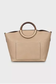 Tote bag with woven handles