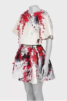 Skirt suit decorated with flowers