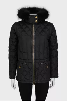 Quilted jacket with gold fittings