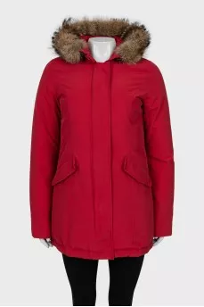 Red parka with fur on the hood