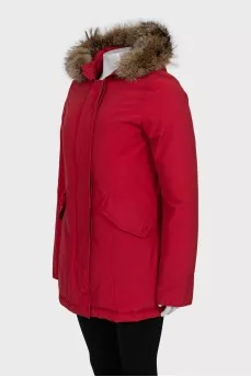 Red parka with fur on the hood
