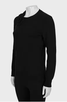 Black jumper with collar decoration