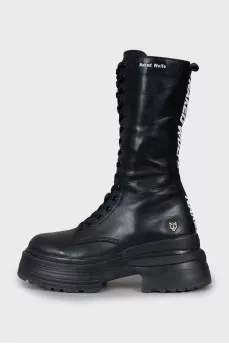 High leather boots on a platform