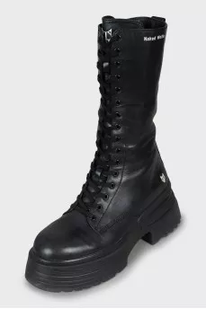 High leather boots on a platform