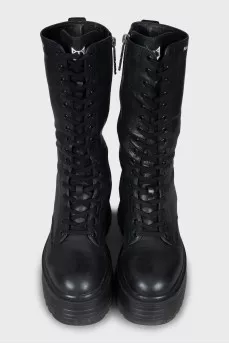 High leather boots on a platform