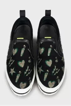 Textile slip-ons on a high platform