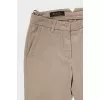 Beige trousers with a mid-waist