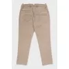 Beige trousers with a mid-waist